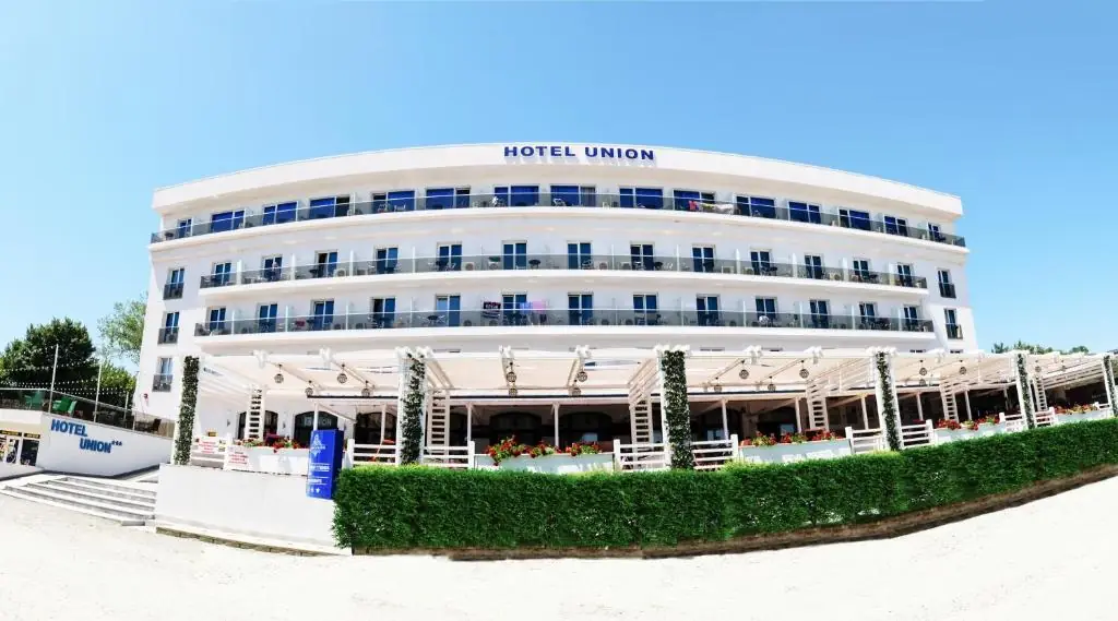 Hotel Union exterior facade with terrace and gardens in Eforie Nord